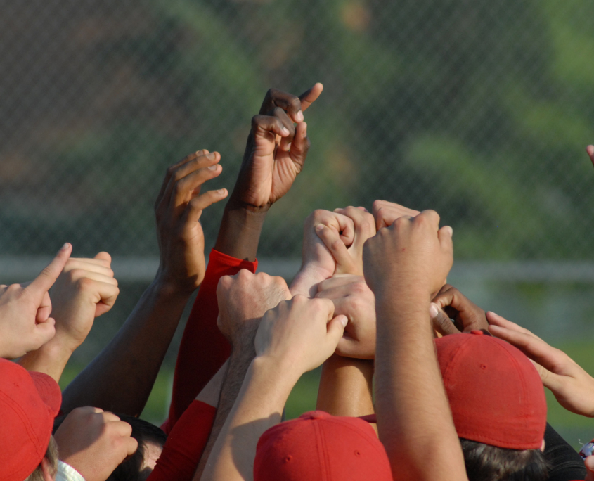 Closeup Of Raised Hands In Baseball Field, Cheering At Game